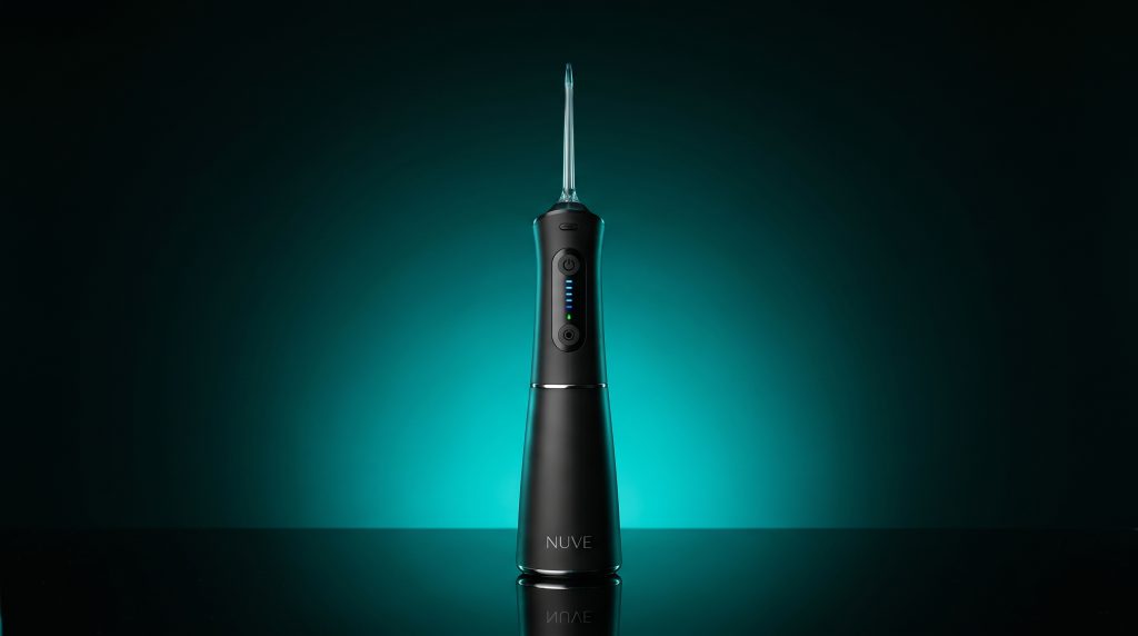 Nuve Water Flosser cordless unit standing upright with 360-degree nozzle